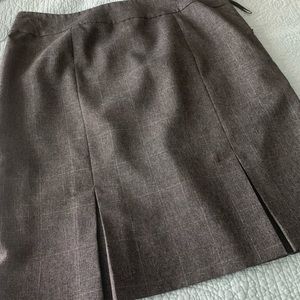 Pencil skirt with kick pleat